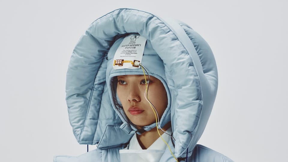 Wearable Sleep Technology: ZZZN Puffer Jacket Transforms Rest on the Go